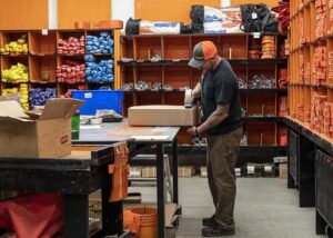 Canyon Rigging Staff Packaging Orders to Ship Across Canada