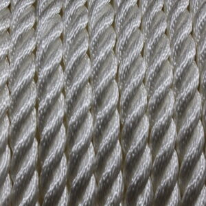 Canyon Rigging Product Photo. The photo Shows a roll of three strand rope . the rope is white and clean.