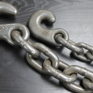 Product photo of Tail Chains. In this photo there are two tail chains one above another. The tail chains have hooks on their end.