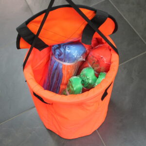 Canyon Rigging Tool Bag product photo. the bag is coloured orange. it is filled with canyon rigging round slings.