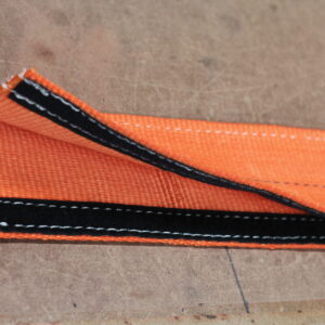 Canyon Rigging product Photo of Velcro Wear Pad. The pad is orange and has black Velcro.